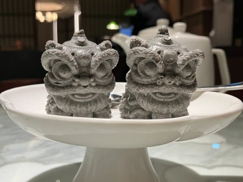 Cute Chinese guardian lion black sesame pudding dessert